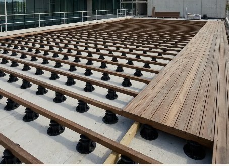 Timber deck installed on adjustable pedestals on a rooftop